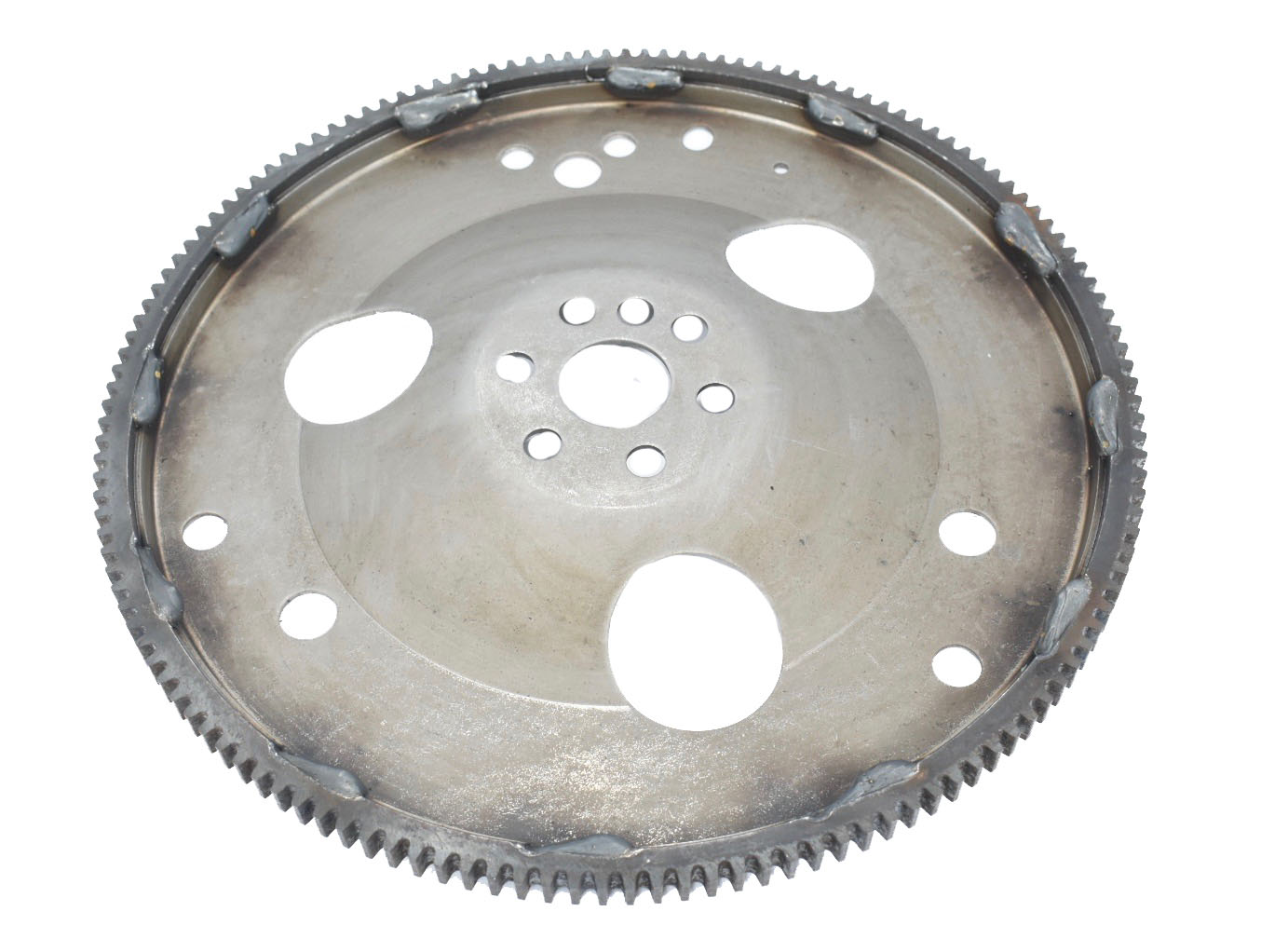 AA-G171ARO DENTADO (VOLANTE O CREMALLERA) AUTOMATICA PLATO FLEXIBLECHEVROLET GMC PICK-UP S10 / BLAZER (94-02) 2.2 LITROS 4 CILINDROS , SONOMA (94-03), SYCLONE (94-00), TYPHONN (94-03) ISUZU HOMBRE (97-00) 2.2 LITROS FLY WHEEL DIAMETRO EXTERIOR: 11.91 CONTRAPESO: (NO) DIENTES: 142AA-G171 / 24575991 / GM-171 CHROMITE / 6181419 - Imagen 4